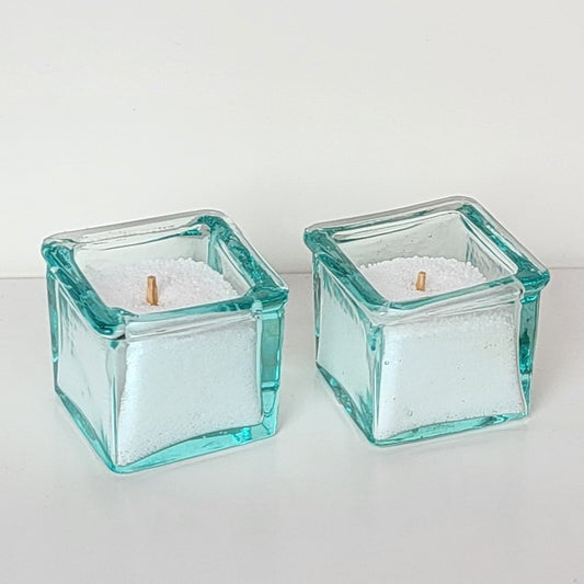 Viereckige Teelichthalter aus getöntem Glas